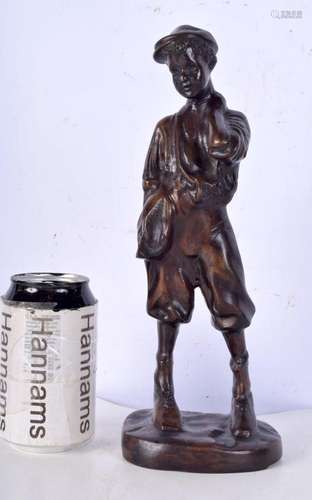 A bronze figure of a boy 28 cm.