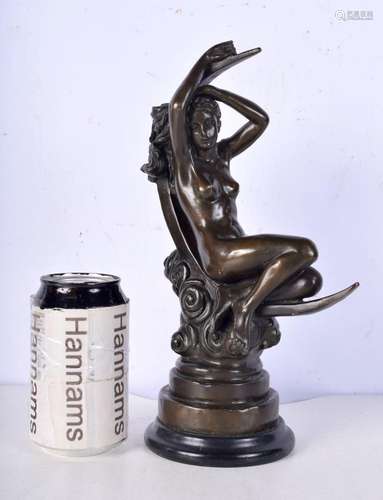 A bronze figure of a naked female mounted on a plinth 28 cm.