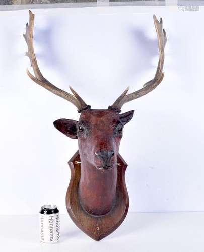 An vintage paper mache mounted stags head 82 x 56 cm