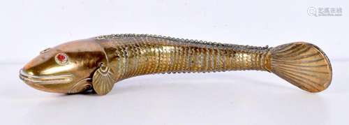 A Persian brass articulated fish 24 cm.