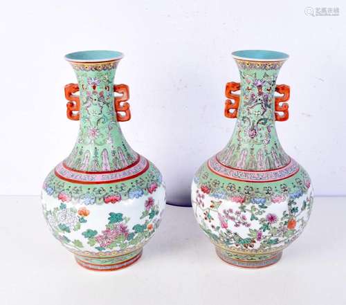 A large pair of 20th century Chinese famille rose vases bear...