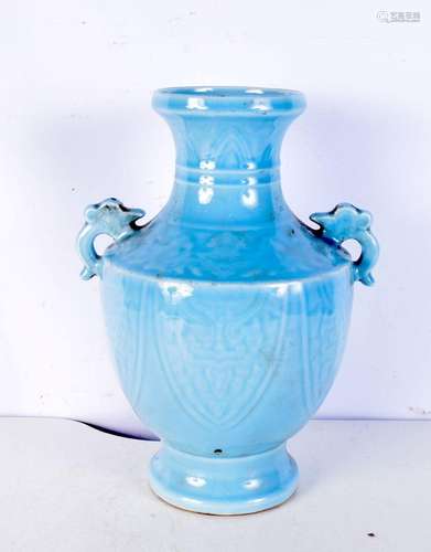 A large Chinese blue ground twin handled porcelain vase bear...