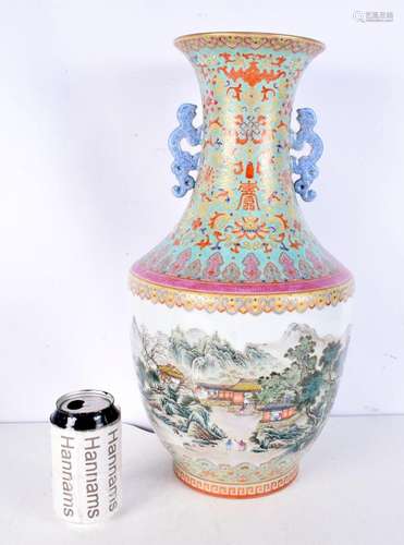 A large 20th century Chinese famille rose twin handled porce...