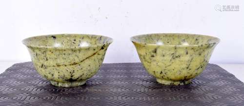 A pair of early 20th century Chinese moss agate bowls, forme...