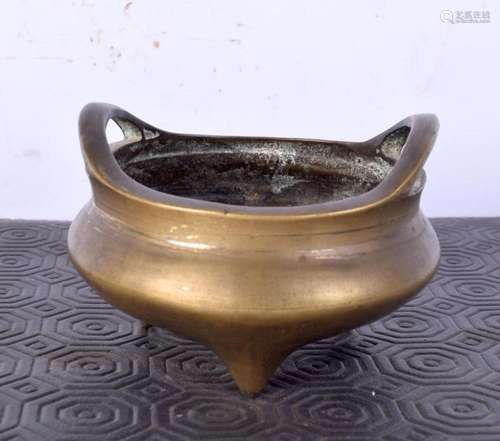 An early 20th century Chinese bronze censer, formed with hig...