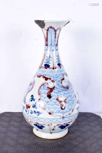 A Chinese blue and white porcelain vase, decorated with wave...