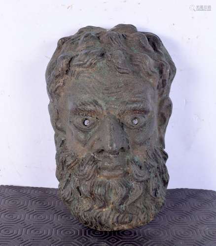 An Italian Bronze mask, formed as a bearded male. 23 cm x 15...