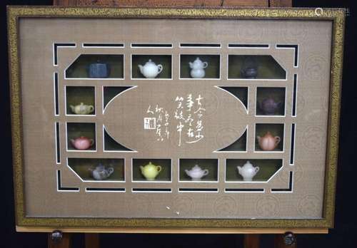 A framed display of Chinese carved hardstone miniature tea p...