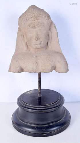 A Cambodian stone head on a stand 45 x 26 cm.