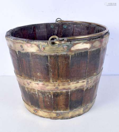 A 19th Century copper bound wooden bucket 25 x 44 cm.