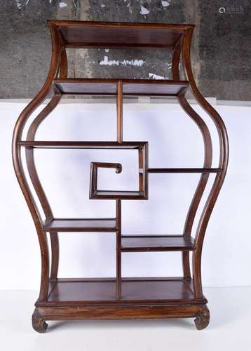 An early 20th Century carved hardwood display stand Late Qin...