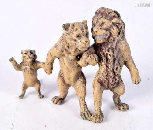 A cold painted bronze lion group 6.5 x 8.5 cm.