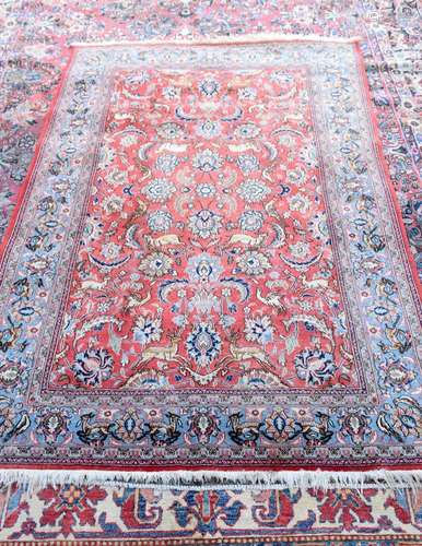 A Persian rug 204 x 144 cm.