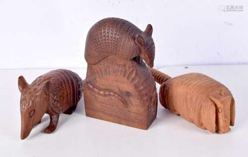 A collection of carved wooden Armadillos in different styles...