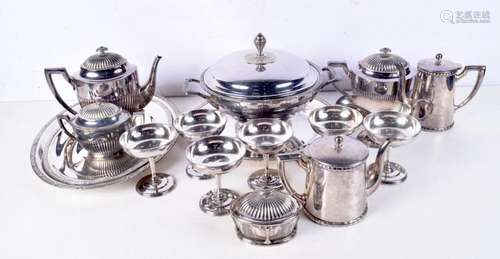 A collection of silver plated items, including serving items...