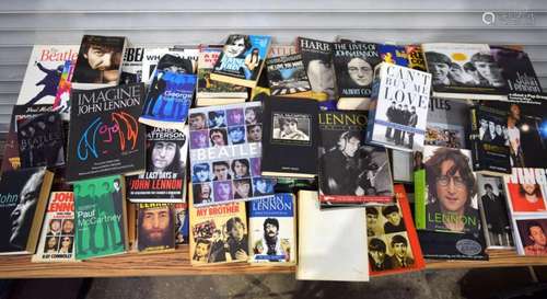 A collection of books all related to The Beatles. Two crates...