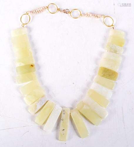 A Hardstone Necklace with Silver Gilt Mounts. 48cm long