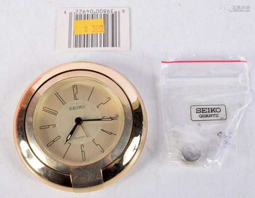 A Seiko Quartz Desk Clock. 7.6cm diameter x 1.8cn, not worki...