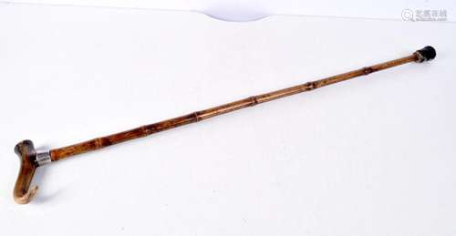 A Rhino horn handled bamboo cane 80m cm.