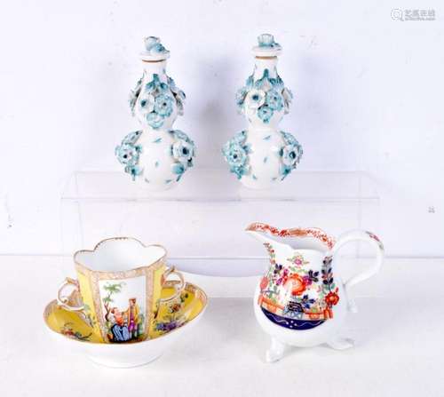 A Meissen cream jug and tea cup together with a pair of Sitz...