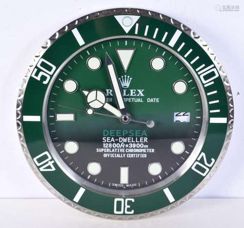 A Contemporary Rolex dealership style wall clock 34 cm