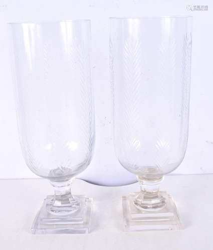 A pair of cut glass hurricane lamps 40 cm.