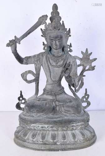 A large bronze figure of Tara 35 cm .