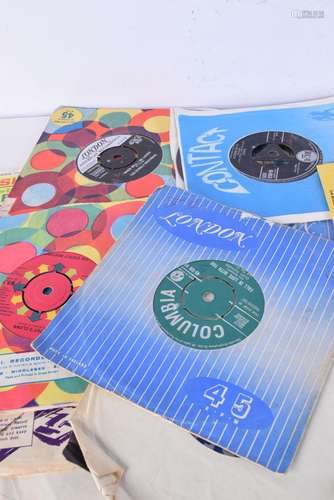 A collection of single Vinyl singles , including Elvis, 50&#...