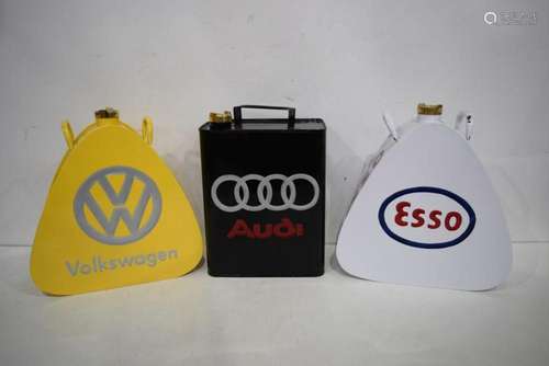 A collection of branded oil cans Audi, Volkswagen and Esso 3...