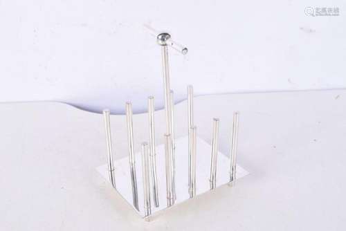 A silver plated Dresser style toast rack 17 x 13 cm