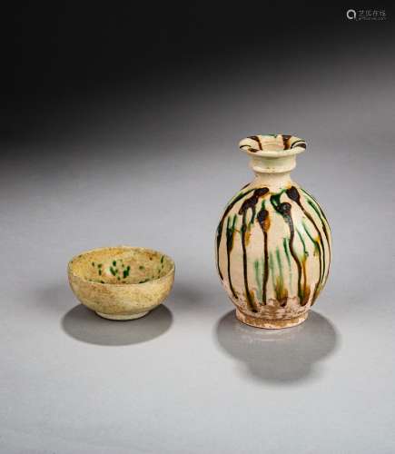 A sancai-glazed vase and a small green-splashed bowl, Tang d...