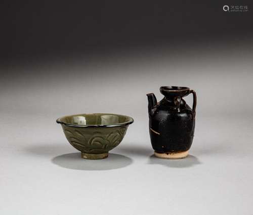 A small Henan black-glazed ewer and a 'Yaozhou' cela...