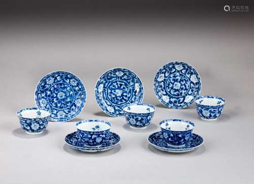 A group of five blue and white 'flowers' cups and sa...