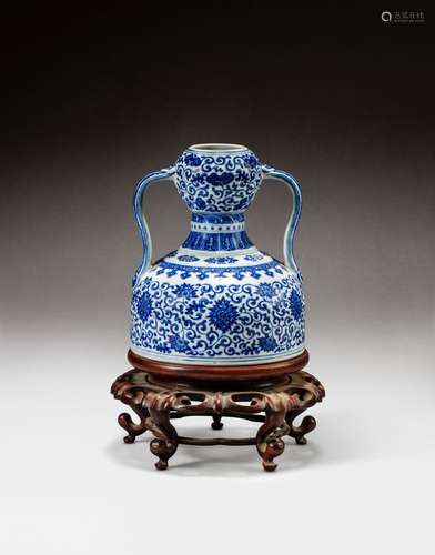 A blue and white double-gourd and ‘ruyi’ handled ‘lotus’ fla...