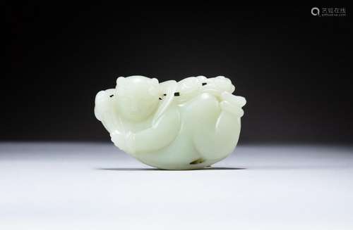 A pale celadon jade 'boy and lotus' pebble, 19th - 2...