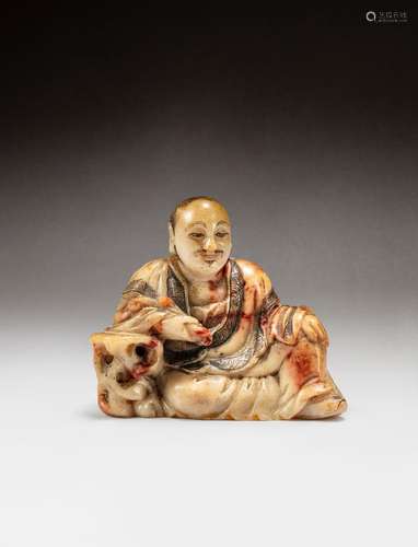 A carved soapstone figure of a Luohan,  Qing dynasty, 18th c...