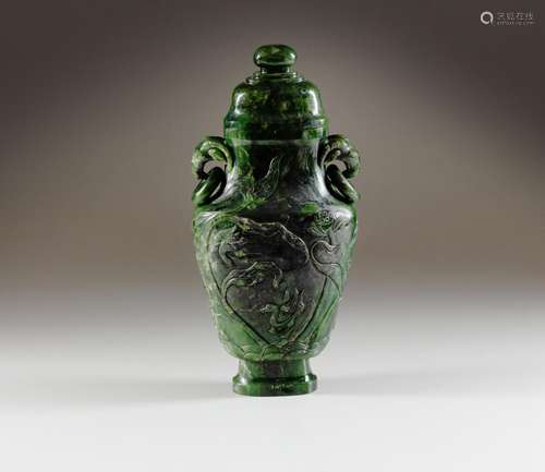 A large and impressive spinach jade ‘lotus pond’ vase and co...