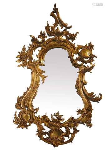 101 Miroir de forme mouvementée en bronze ciselé et doré à d...