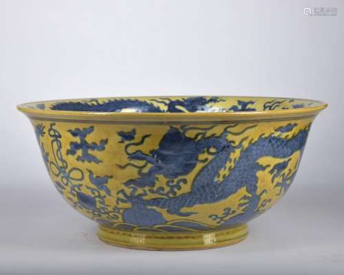 A yellow ground blue and white 'drgaon' bowl