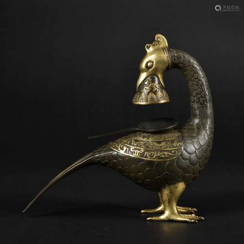 A bronze bird censer