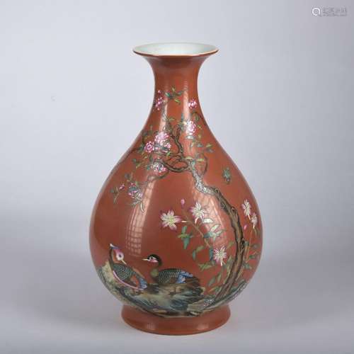 A red ground famille-rose 'floral' pear-shaped vase