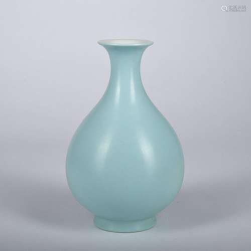 A celadon-glazed pear-shaped vase