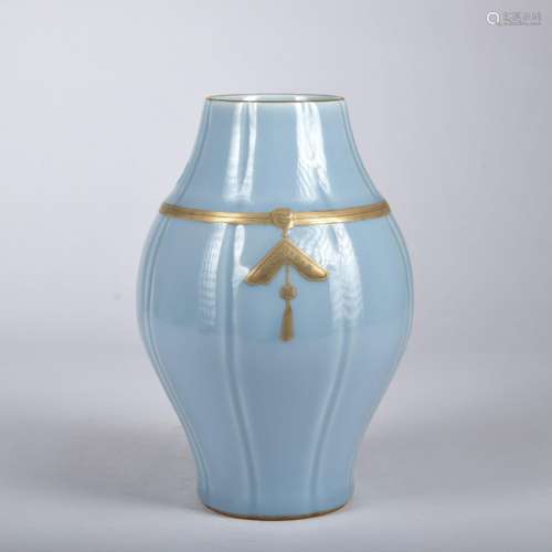 A celadon-glazed vase