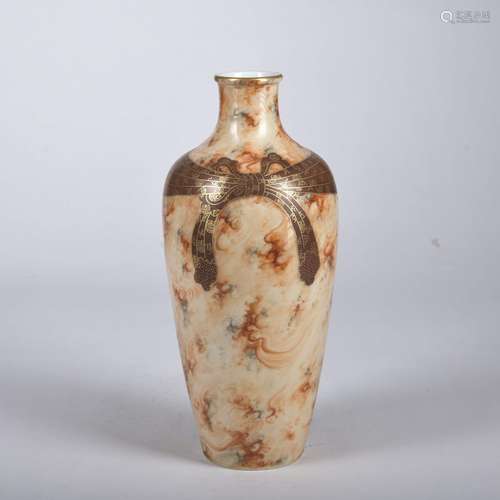 A wooden glazed vase