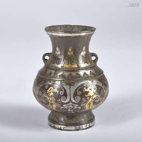 A bronze vase ware with gold and silver