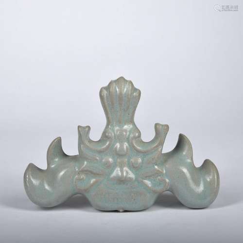 A celadon-glazed pen holder