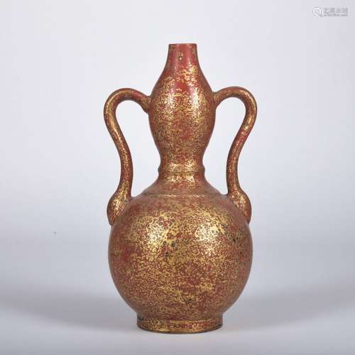 A red ground gourd-shaped vase