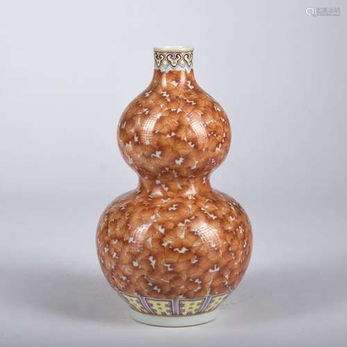 An allite red glazed gourd-shaped vase