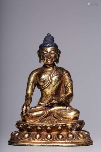 A gilt-bronze seated figure of Shakyamuni, Qing Dynasty