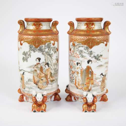 Pair of Japanese vases carried by 3 Kutani figures, late 19t...